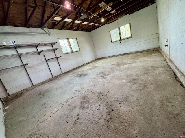 garage featuring concrete block wall
