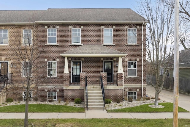 624B N Notre Dame Ave Unit B, South Bend, IN 46617 - townhome / multi-family property with roof with shingles and brick siding