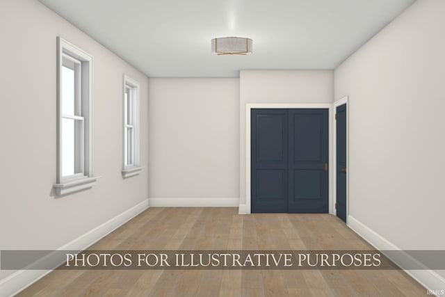 624B N Notre Dame Ave Unit B, South Bend, IN 46617 - spare room featuring wood-type flooring and baseboards