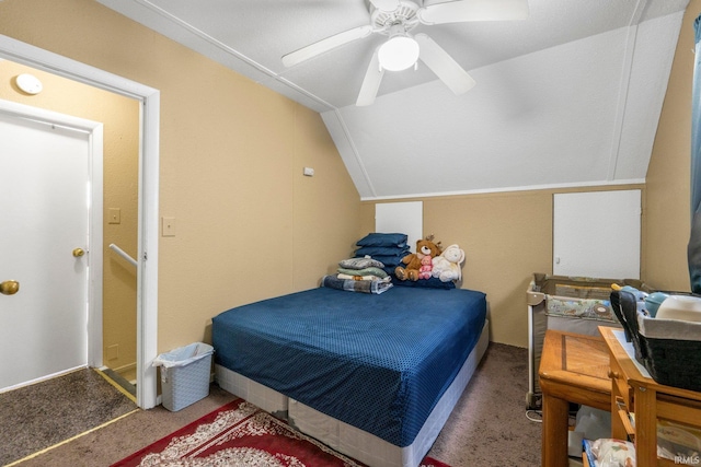 bedroom featuring a ceiling fan, carpet, and vaulted ceiling