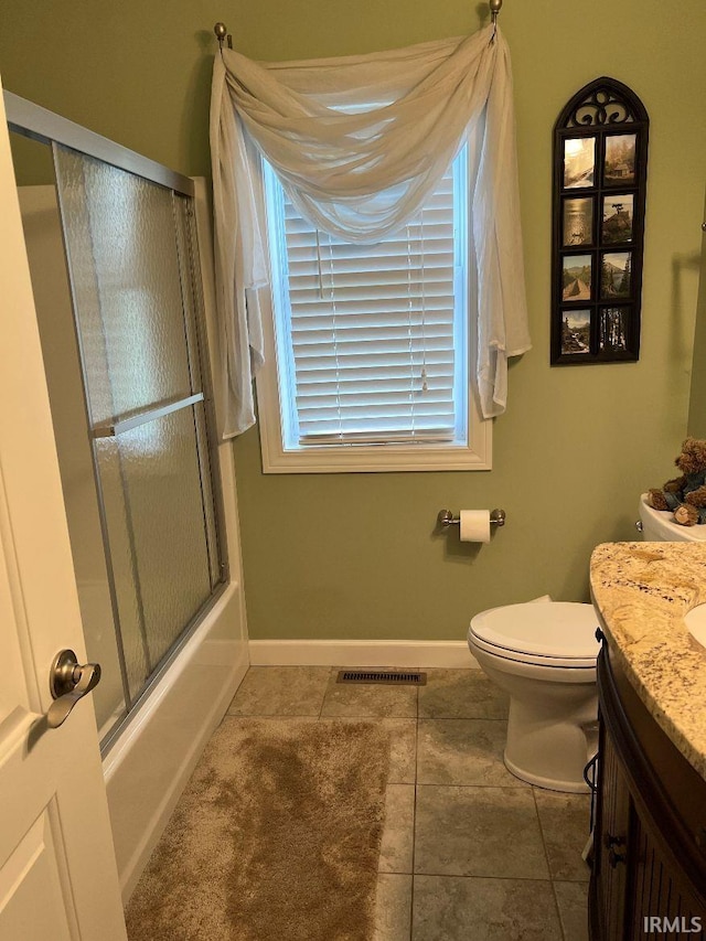 full bathroom featuring visible vents, tile patterned flooring, vanity, toilet, and baseboards