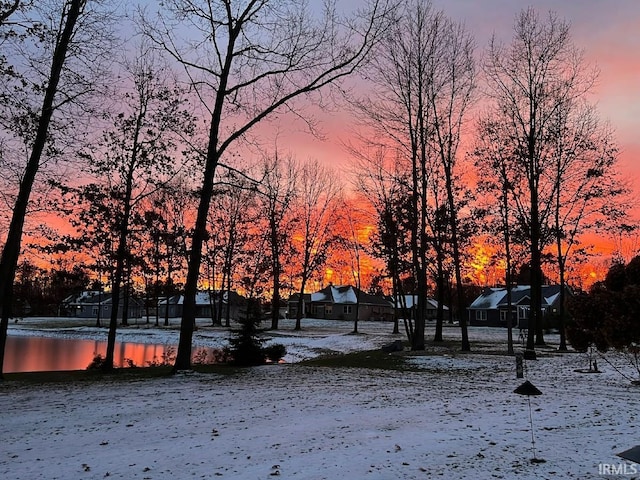 view of home's community with a water view
