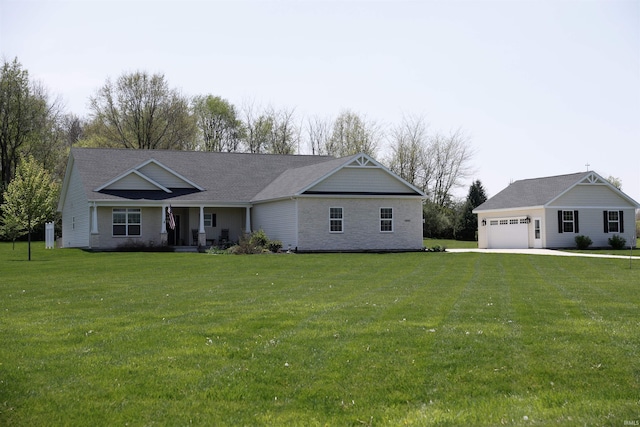 ranch-style house featuring an attached garage, a porch, and a front lawn