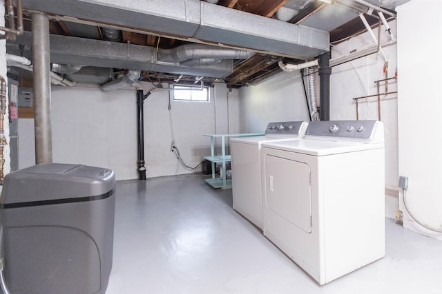 laundry area featuring laundry area and washer and clothes dryer