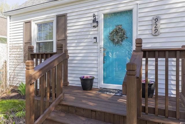 doorway to property featuring a deck