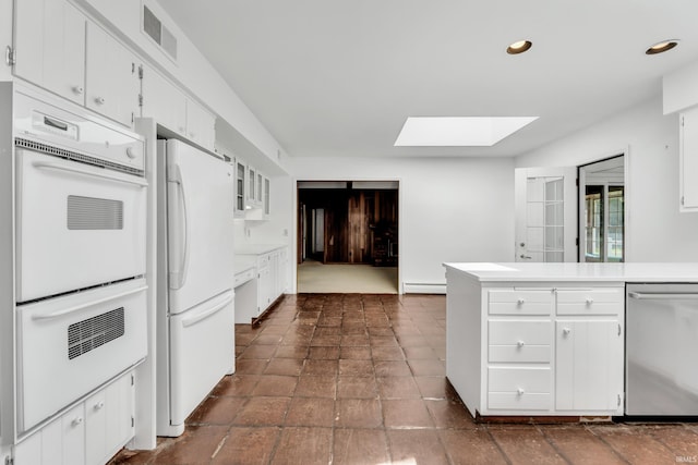 8818 Fortuna Way, Fort Wayne, IN 46815 - kitchen with visible vents, white appliances, white cabinetry, a baseboard radiator, and a skylight