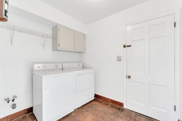 8818 Fortuna Way, Fort Wayne, IN 46815 - laundry room featuring baseboards, washing machine and dryer, and cabinet space