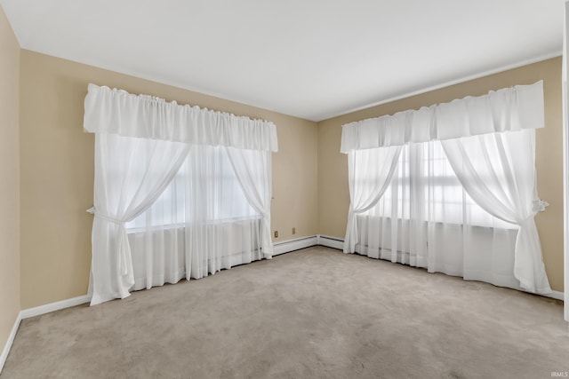 8818 Fortuna Way, Fort Wayne, IN 46815 - carpeted spare room featuring baseboards and a baseboard radiator