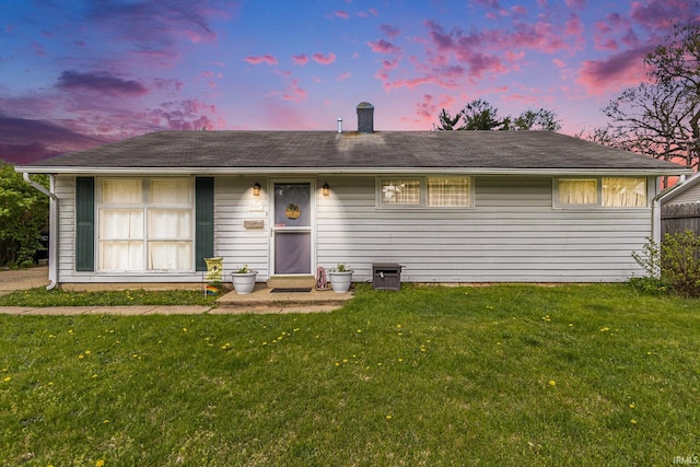 ranch-style house with a front yard
