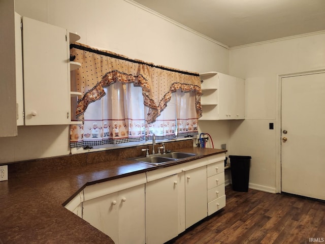 2203 S Valley Ave, Marion, IN 46953 - kitchen with open shelves, dark countertops, a sink, dark wood finished floors, and ornamental molding