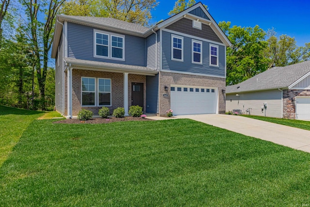 craftsman inspired home featuring an attached garage, concrete driveway, and a front yard