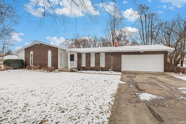 ranch-style home with concrete driveway, brick siding, a chimney, and a garage