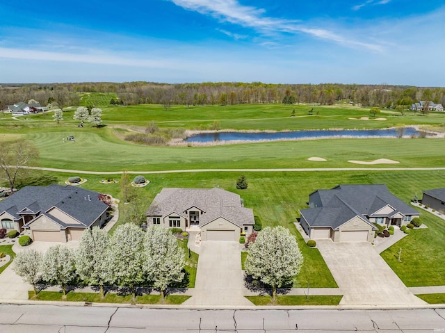 bird's eye view with view of golf course and a water view