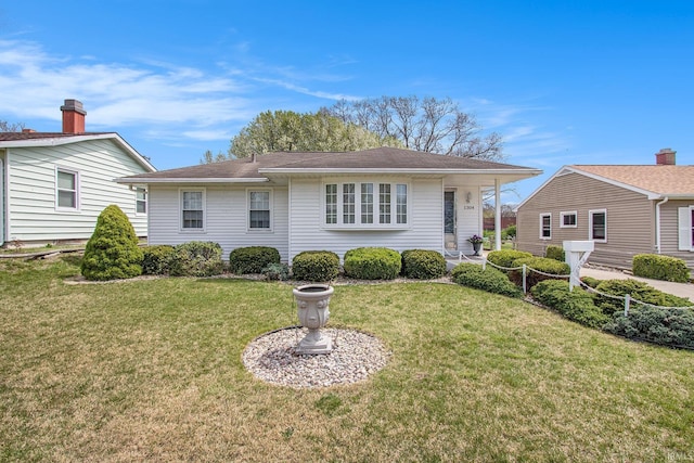 view of front facade with a front yard
