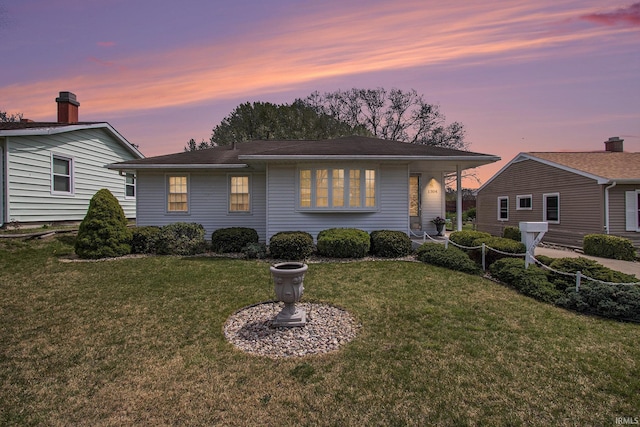 view of front of property with a front yard