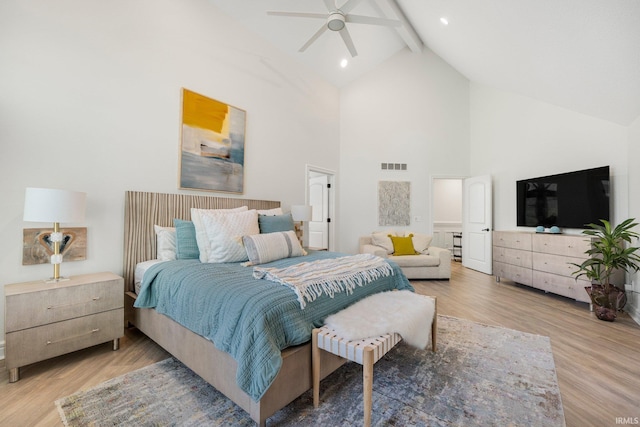bedroom with high vaulted ceiling, visible vents, beam ceiling, and wood finished floors