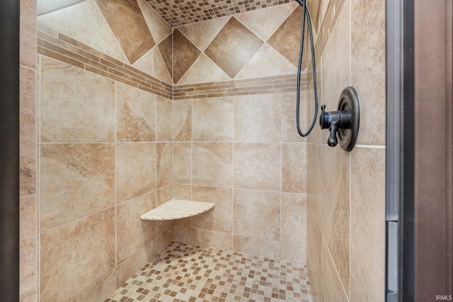 bathroom featuring tiled shower