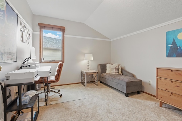carpeted office space with baseboards and vaulted ceiling