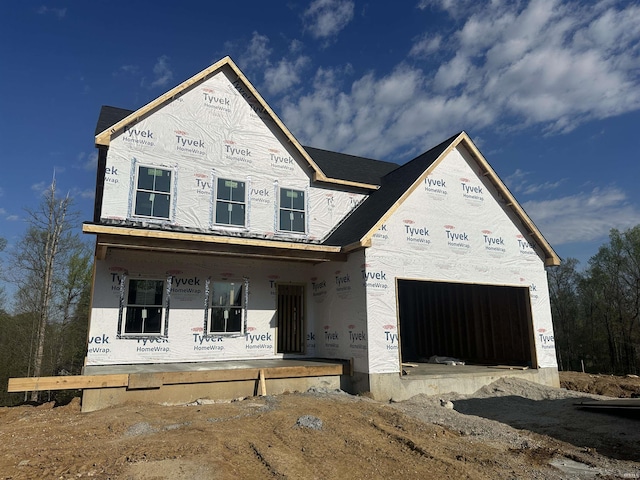 property under construction with covered porch