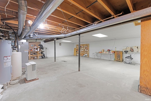 unfinished below grade area with electric water heater