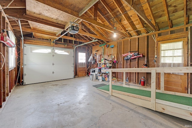 garage featuring a garage door opener