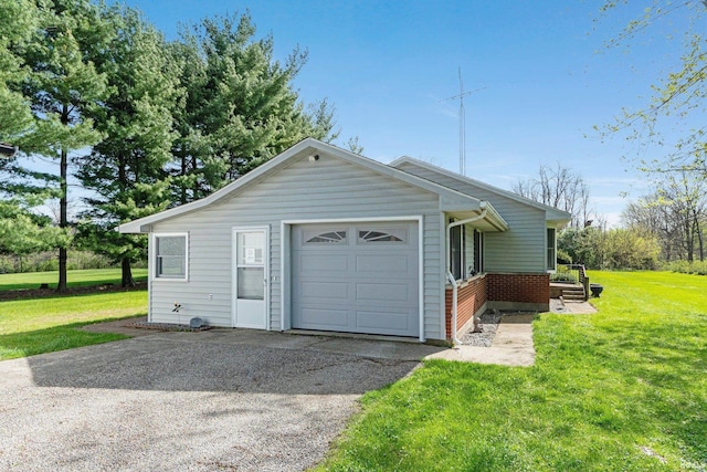 view of property exterior with a lawn, brick siding, a garage, and aphalt driveway