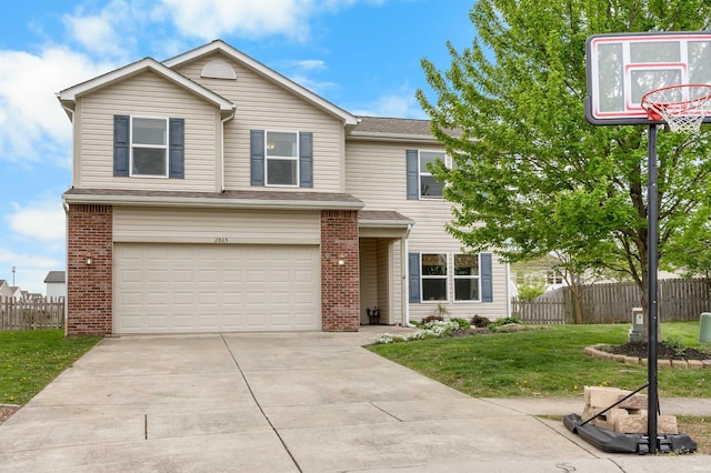 traditional-style home featuring a garage, a front lawn, fence, brick siding, and concrete driveway