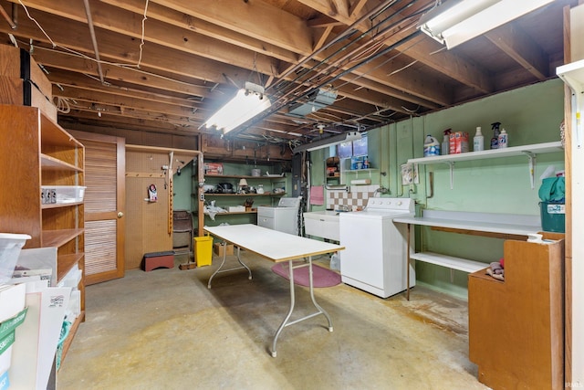 unfinished basement featuring washer and dryer
