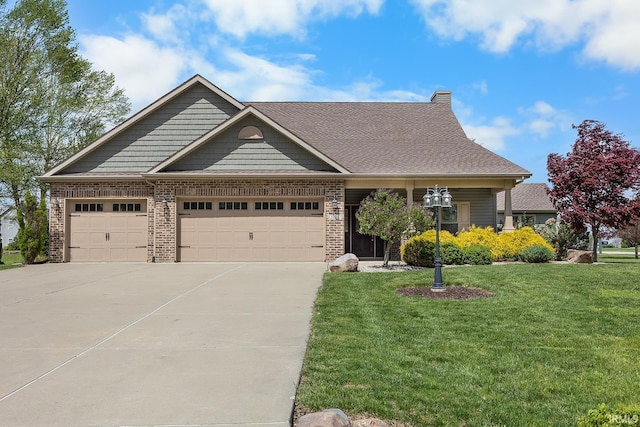 craftsman-style home featuring a chimney, a front yard, brick siding, concrete driveway, and an attached garage