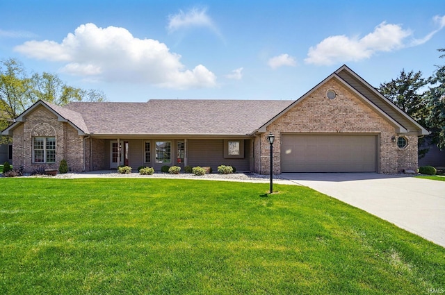 ranch-style house featuring brick siding, a front lawn, and a garage