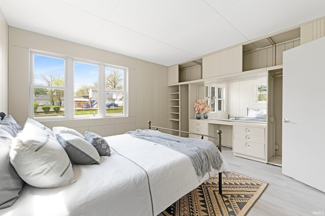 bedroom with light wood-style floors