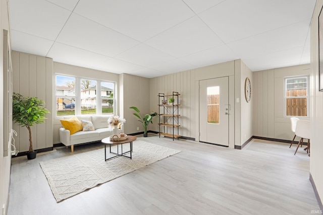 living room featuring a healthy amount of sunlight and wood finished floors