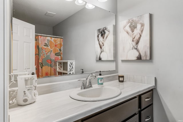 full bathroom featuring vanity