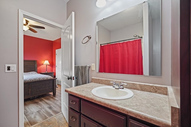 202 Jeremy Dr, Milford, IN 46542 - ensuite bathroom featuring vanity, a ceiling fan, and connected bathroom