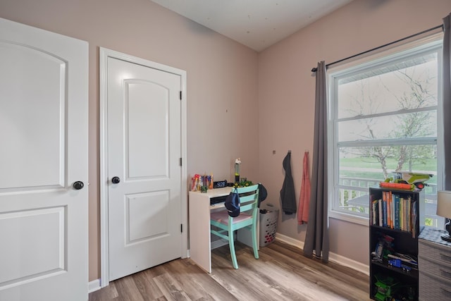 202 Jeremy Dr, Milford, IN 46542 - interior space featuring light wood-type flooring and baseboards