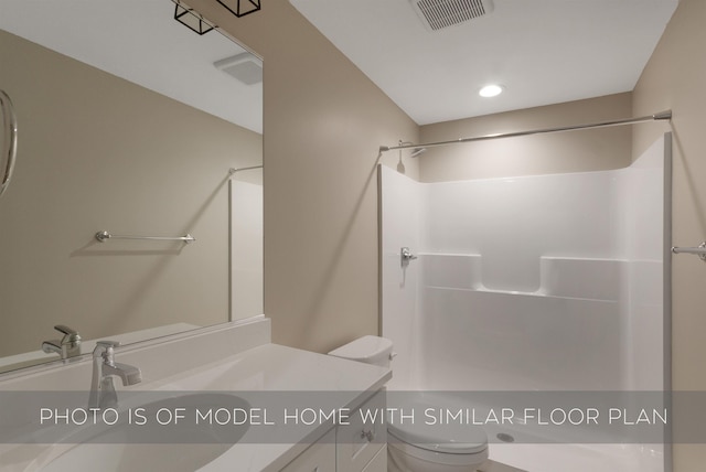 full bath featuring vanity, toilet, recessed lighting, bathing tub / shower combination, and visible vents