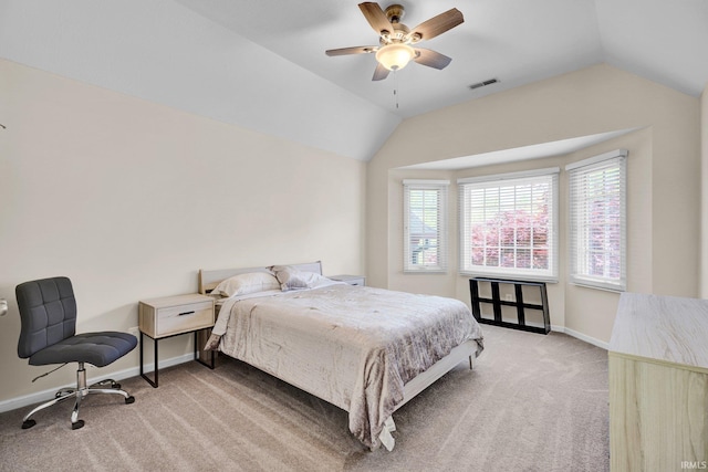 7911 N Thames Dr, Bloomington, IN 47408 - bedroom featuring light colored carpet, a ceiling fan, baseboards, lofted ceiling, and visible vents