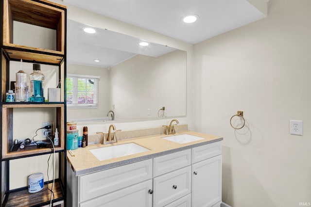 7911 N Thames Dr, Bloomington, IN 47408 - full bath with recessed lighting, a sink, and double vanity