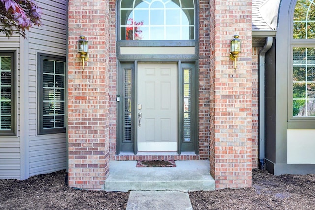 7911 N Thames Dr, Bloomington, IN 47408 - property entrance with brick siding