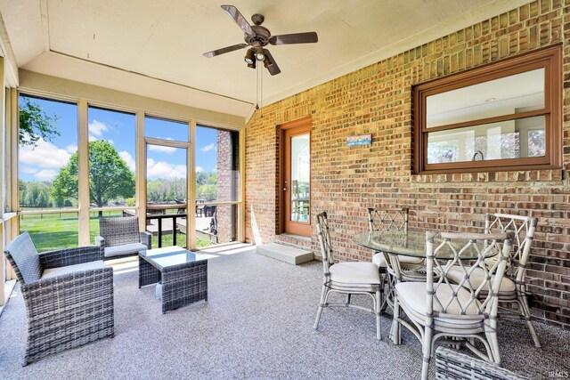 7911 N Thames Dr, Bloomington, IN 47408 - sunroom / solarium featuring outdoor dining area, ceiling fan, and outdoor lounge area