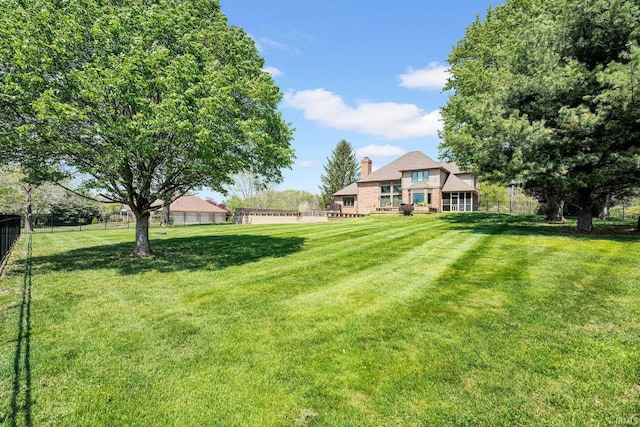 7911 N Thames Dr, Bloomington, IN 47408 - view of yard featuring fence