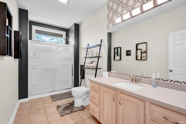 7911 N Thames Dr, Bloomington, IN 47408 - bathroom with vanity, tile patterned floors, toilet, and a shower stall