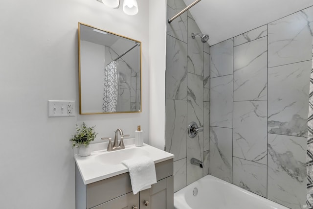 bathroom with vanity and shower / tub combo
