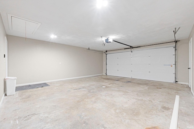 garage featuring baseboards and a garage door opener