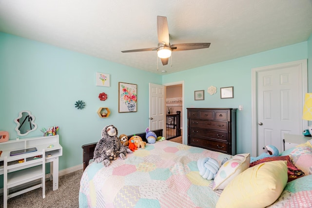 bedroom featuring carpet floors, a ceiling fan, and baseboards