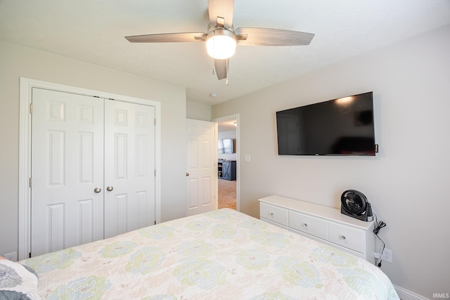 bedroom with a ceiling fan and a closet