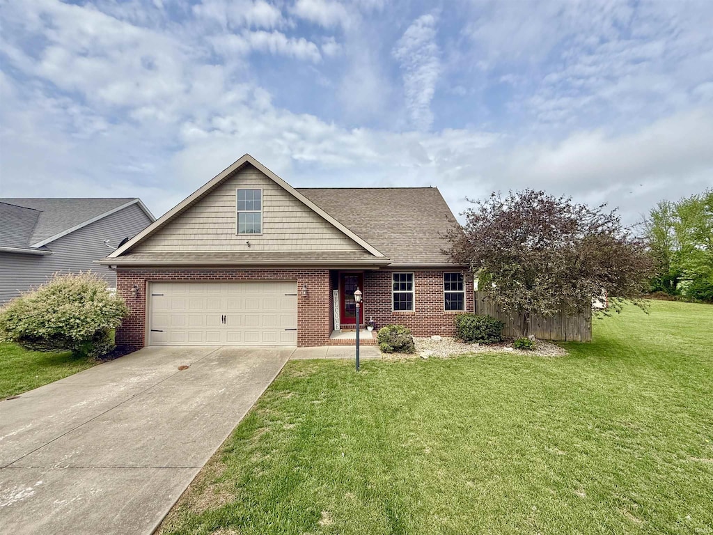 15520 Aj Dr, Evansville, IN 47725 - traditional-style home featuring brick siding, concrete driveway, a front yard, and an attached garage