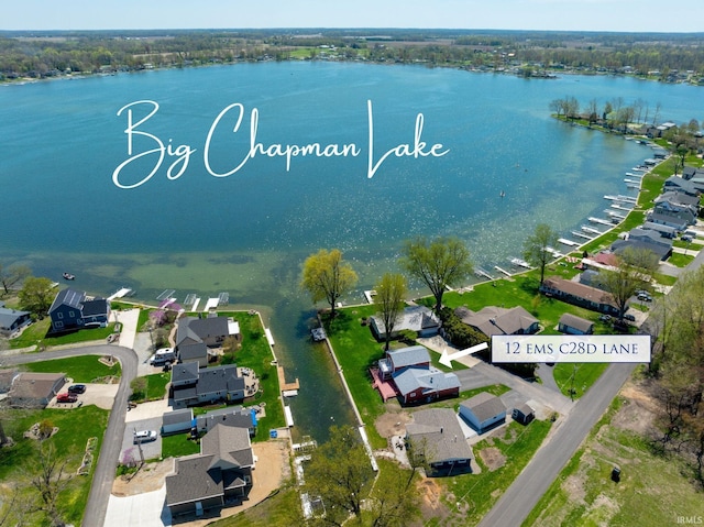 bird's eye view with a water view and a residential view