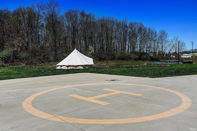 13341 Leesburg Rd, Fort Wayne, IN 46818 - view of basketball court with a lawn and community basketball court