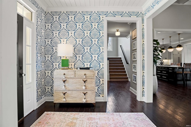 13341 Leesburg Rd, Fort Wayne, IN 46818 - entrance foyer featuring baseboards, ornamental molding, wallpapered walls, and dark wood-style flooring